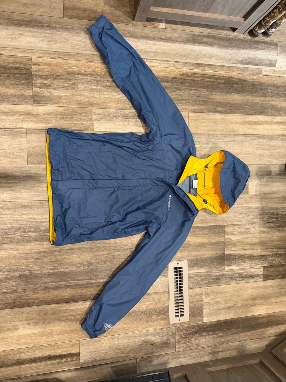 Columbia Blue Rain Jacket with Yellow Lining
